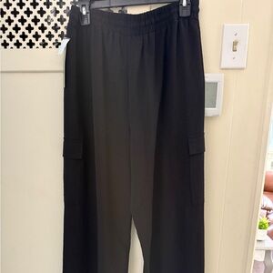 NYC Classic Black Slacks. Side pocket accent on each leg. Smoke & Pet Free Home.